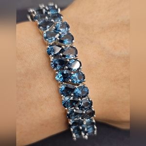 London Blue Topaz pear shape line bracelet. 925 silver, 7" circumference, NWOT